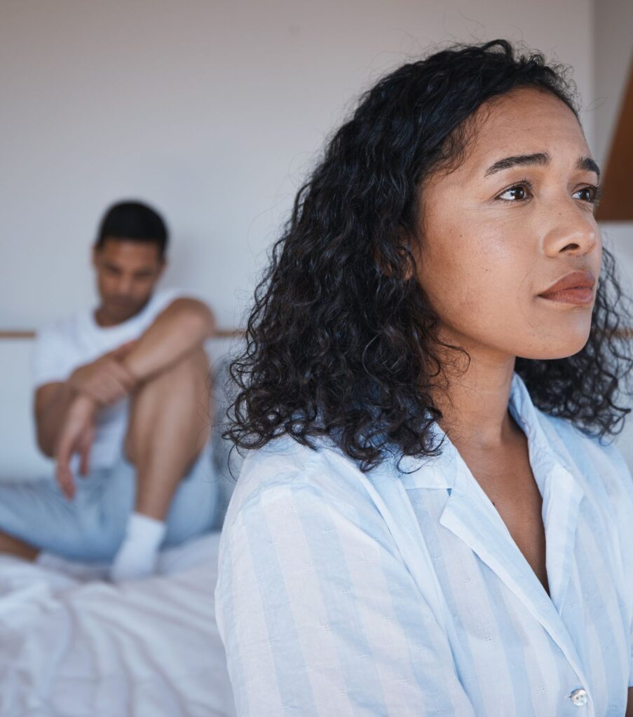 A sad woman in front of a sad looking man in a bedroom. Are you trying to end an affair but not sure how? You are not alone. An affair recovery expert could be just what you need. Schedule a free consultation with our experts to see how we can help you in the US, Canada or worldwide. 