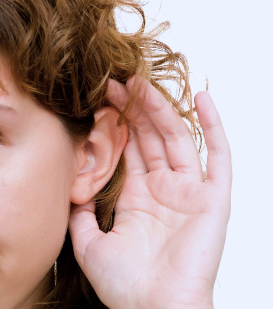 A closeup of a woman's hand on her ear. She is trying to hear what her betrayed partner has to say to her while going through therapy. If you and your partner are in an affair recovery process, we can help with our online affair recovery program in the USA, Canada, and the UK. Read more.
