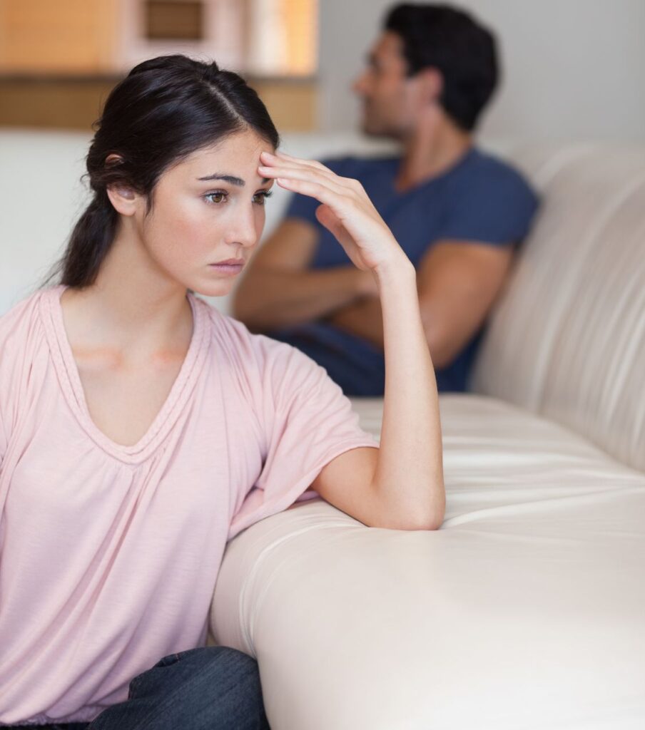 A man looks away from a woman, representing a couple in the aftermath of infidelity. Every unfaithful partner has their own reasons for infidelity. Collaborate with the Relationship Experts team to gain understanding of why infidelity occurs and to navigate the healing process from infidelity in the USA and globally. 