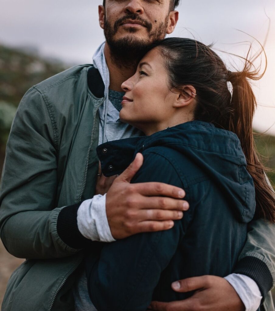 Image of a man embracing a woman, symbolizing rebuilding trust and connection after infidelity. Discover proactive strategies on how to fix a relationship after infidelity and cultivate happiness and love. Schedule a free consultation today to learn more. Our services are available in the United States and Globally.