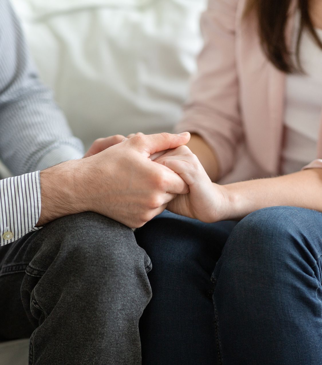 Couple holding hands - Learn how to regain trust after cheating with our relationship experts guidance. Schedule a consultation to rebuild trust. Serving couples in California, North Carolina, Illinois, Florida, Colorado, Virginia, New York in the United States, Canada, and globally.