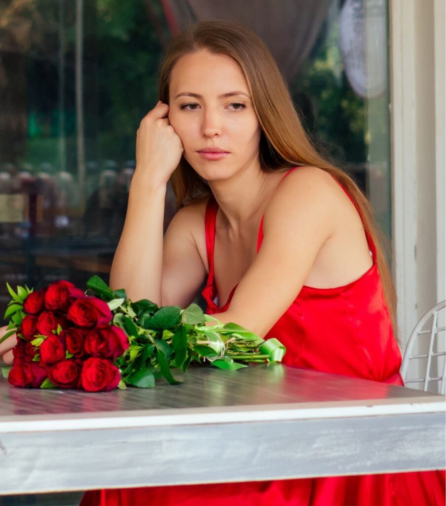 A disappointed looking woman sits next to a table with a bouquet of roses. For effective reconciliation after infidelity contact Relationship Experts online. Serving couples in Ohio, the USA, Canada, the UK and Australia.
