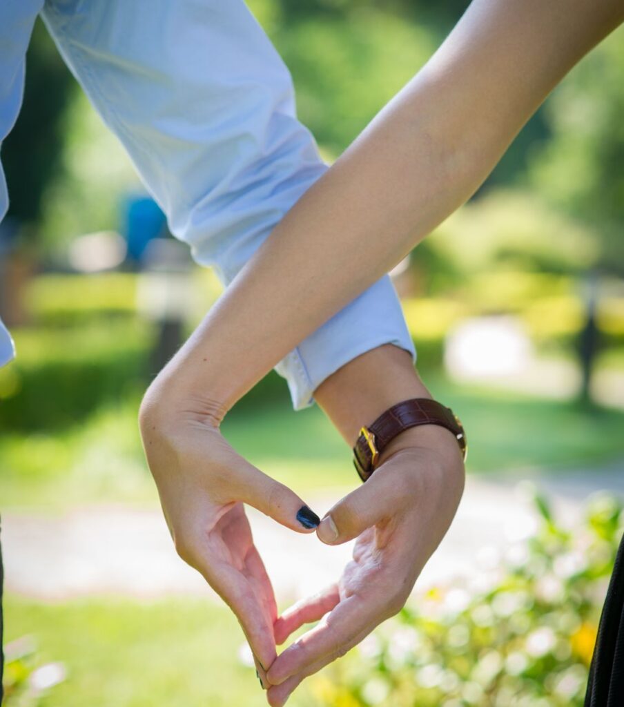 A man and woman’s hands form a heart, symbolizing healing and growth. Our Infidelity Recovery Program offers proven methods for lasting relationship success in the USA and globally.

