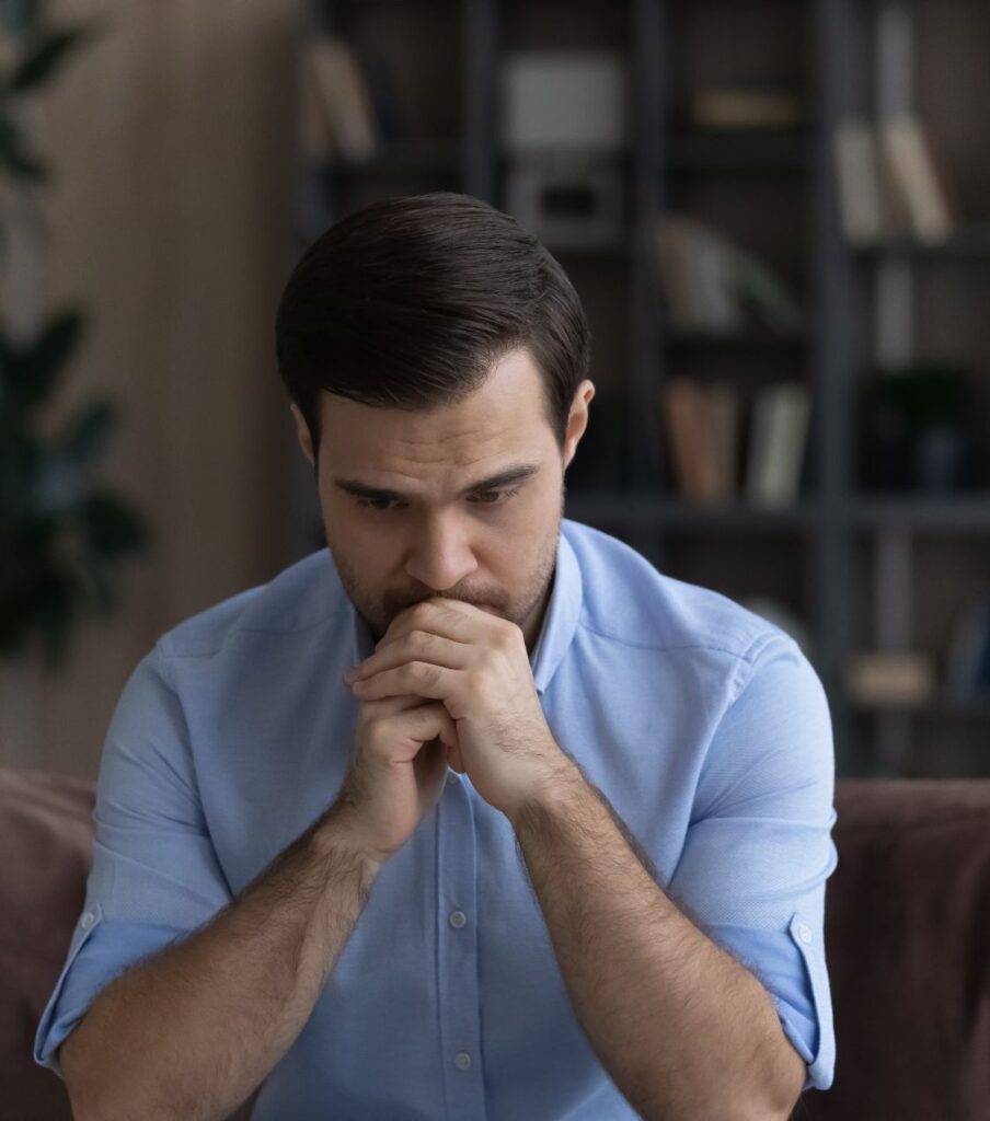 A man lean his chin on his hands | Stop missing your affair partner in the United States | How to end an affair in the USA | Canada | the UK A man rests his chin on his hands, struggling with how to end an affair he never intended to start. Contact Relationship Experts to learn how to end an affair. Offering affair recovery program in the USA, Canada, the United Kingdom, and worldwide.