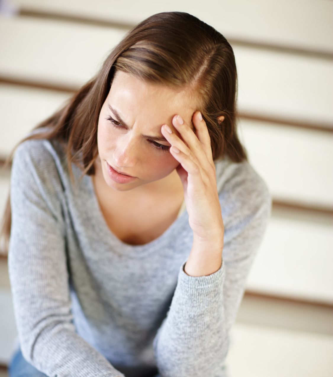 A woman leans her head on her hand, reflecting on how her affair began. Learn how to end an affair with Relationship Experts. Helping couples with surviving infidelity in the United States, Canada, the UK, and worldwide. Schedule your free consultation today.