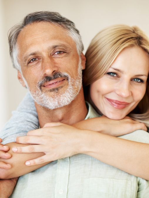 A smiling couple | Learning how to rebuild trust after betrayal in marriage in the United States | Rebuild trust after cheating in the UK | Marriage counseling in Canada A smiling couple reflects progress in learning how to rebuild trust after betrayal in marriage. Relationship Experts can help. Schedule a consultation today in the United States, Canada, the UK, and worldwide.