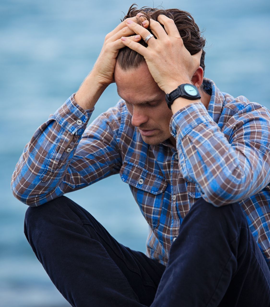 A man holds his hands over his head. Forgiveness after infidelity and healing after infidelity are possible with support. Helping couples in the United States, Canada, the United Kingdom, and globally. Listen to the podcast from Relationship Experts to learn more.