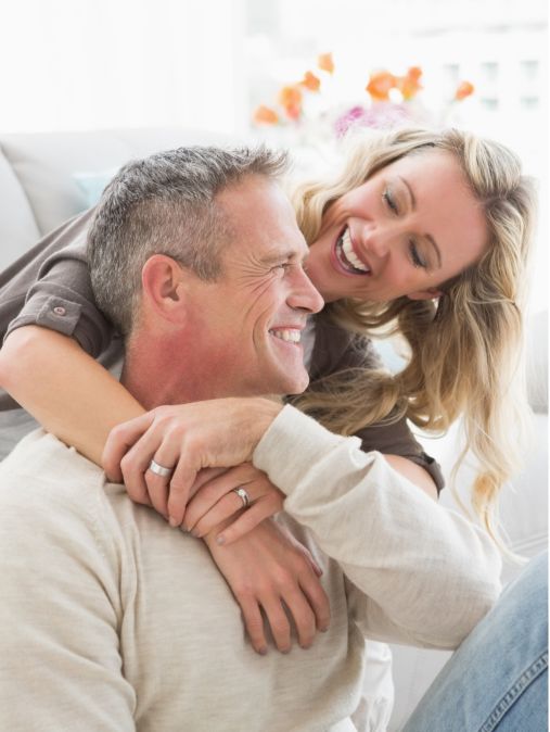 A smiling couple embracing | Recover from an Affair with Professional Affair Recovery guidance | Achieve full recovery and rebuild trust | USA | Canada | The UK | Australia | Worldwide A smiling couple embracing at home, showing hope and connection after betrayal. Learn how to Recover from an Affair with Professional Affair Recovery support for full recovery. Serving couples in the USA, Canada, the UK, Australia, and worldwide. Begin healing together today.