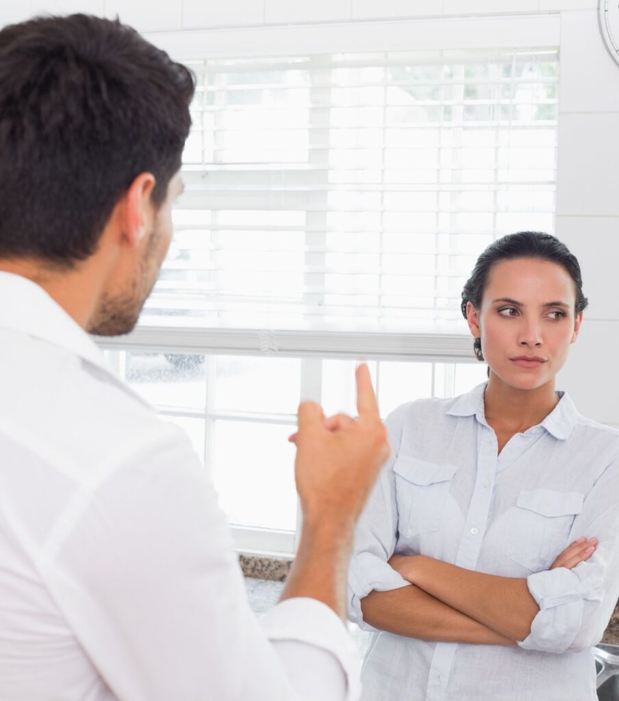 When Do I Walk Away After Infidelity? in the USA | Signs Your Marriage is Headed for Divorce After Infidelity in Dubai | Online Relationship Experts in Canada | Australia | The UK A couple arguing at home after betrayal. The woman looks distant while her partner tries to explain. Discover Signs Your Marriage is Headed for Divorce After Infidelity and know When do I Walk Away After Infidelity? Get guidance from online relationship experts in the USA, Canada, Australia, Dubai, and the UK.