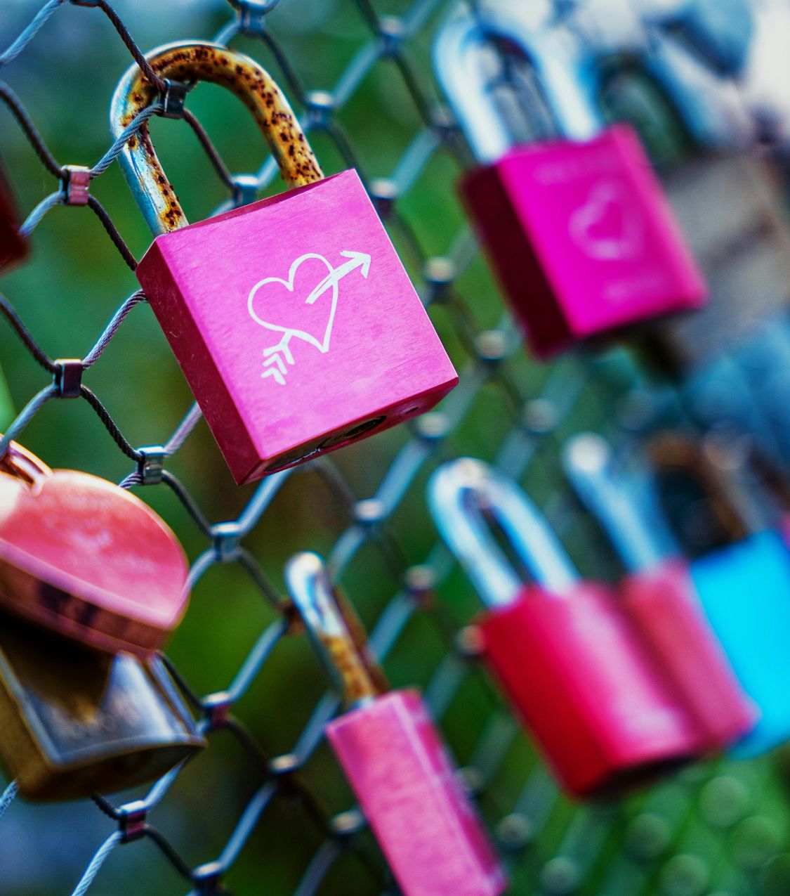 Pink love locks with heart symbol representing relationship after an affair and rebuilding trust through Affair Recovery Program for couples in The USA, UK, and Canada asking can a relationship go back to normal after infidelity